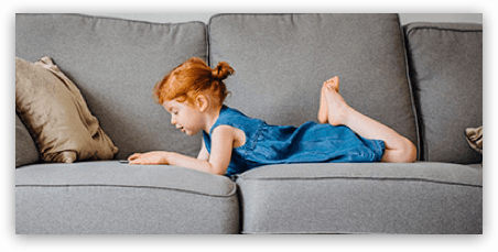 child on couch