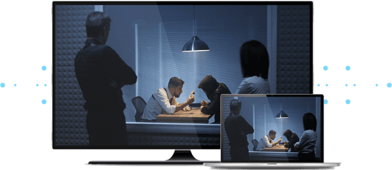 TV and laptop playing a show