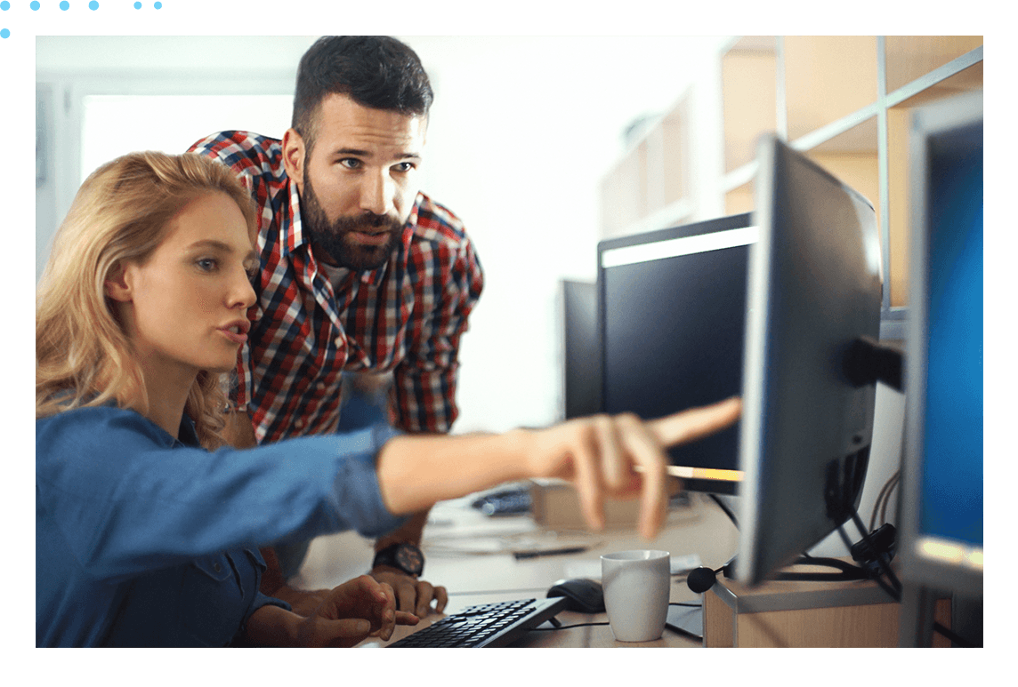 woman pointing to computer